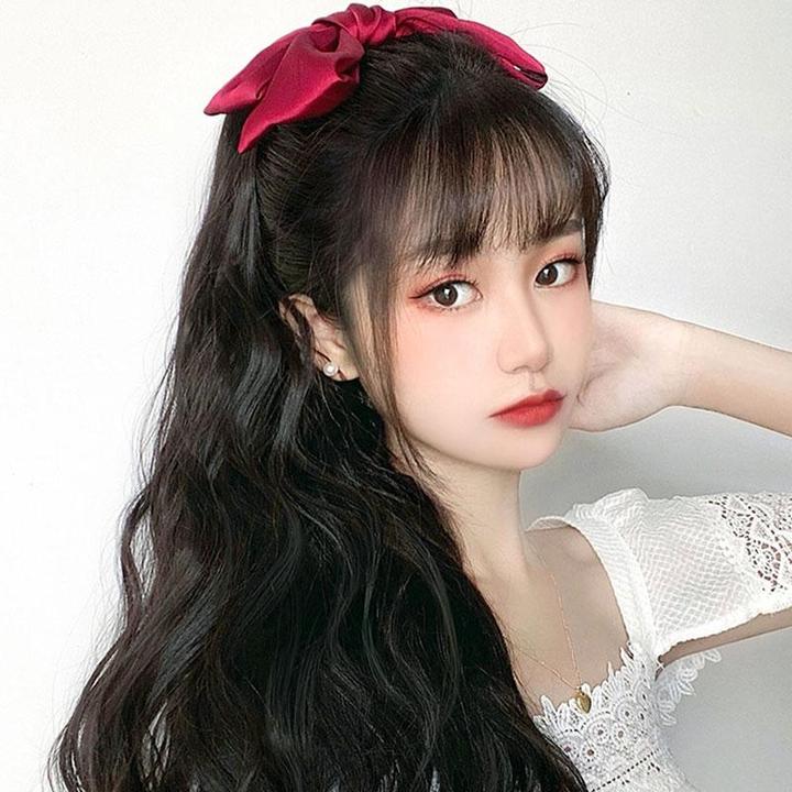 Kucyk z kokardką i klipsem - obrazek 3